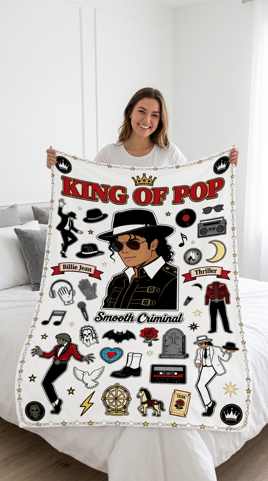 Woman holding up King of Pop full color blanket on white bed