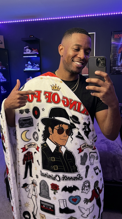 Customer Michael wearing King of Pop blanket as cape
